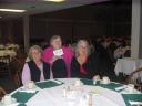 Gloria Holding the QUILTER'S SIGN at Dinner